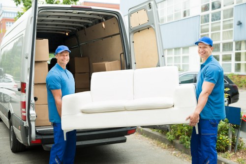 Furniture collection team helping with a local home pick-up in Millhill