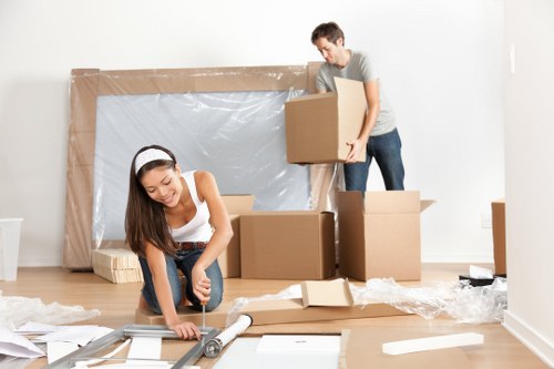 Office removal team preparing desks and boxes for a Millhill business move