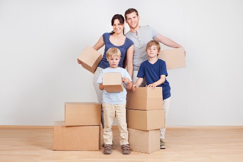 Moving team planning a home removal in a local Millhill street