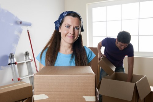 Packed office equipment ready for a commercial move in Millhill