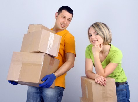 Boxes and furniture prepared for a man and van move