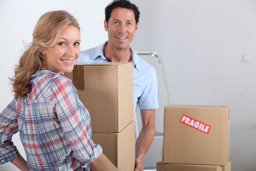 Packed boxes and furniture ready for local removal service