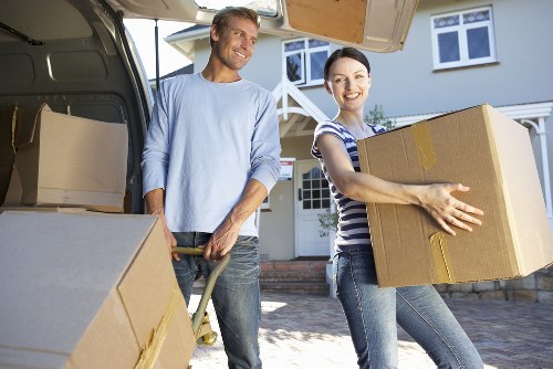 Loading furniture and boxes into a removals van in Millhill